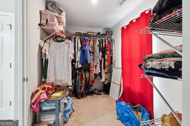 4960 Tadmore Ln, Lithonia, GA 30038 - walk in closet featuring carpet floors