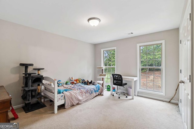 4960 Tadmore Ln, Lithonia, GA 30038 - bedroom featuring carpet floors and baseboards