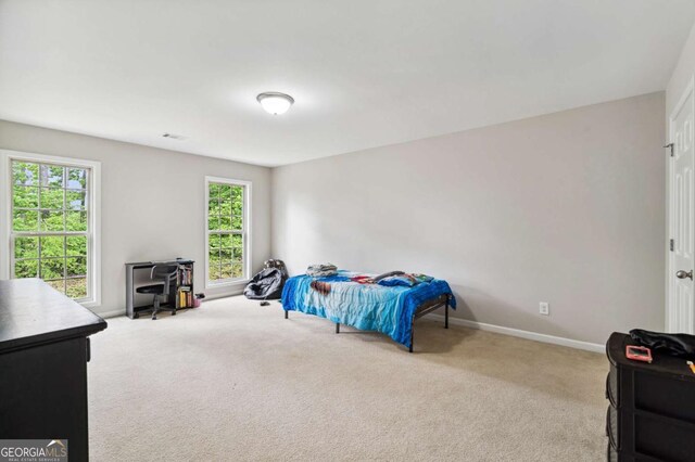 4960 Tadmore Ln, Lithonia, GA 30038 - bedroom featuring carpet flooring, baseboards, and an office area