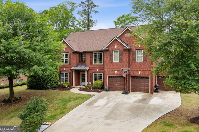 4960 Tadmore Ln, Lithonia, GA 30038 - colonial house with brick siding, concrete driveway, an attached garage, a front yard, and a shingled roof