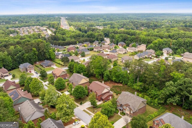 4960 Tadmore Ln, Lithonia, GA 30038 - aerial perspective of suburban area featuring a heavily wooded area