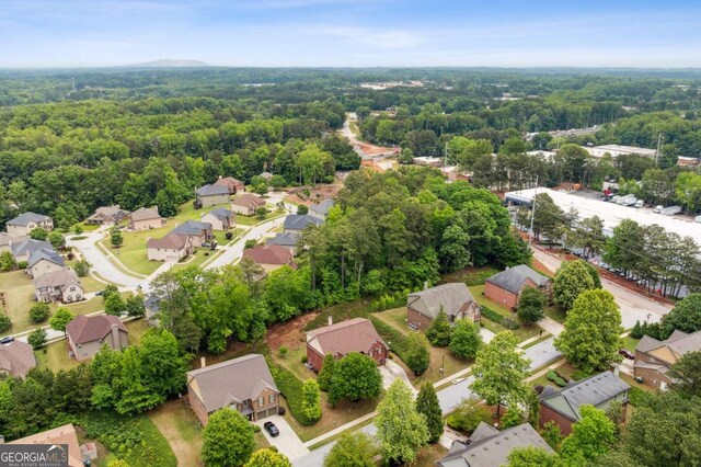 4960 Tadmore Ln, Lithonia, GA 30038 - aerial perspective of suburban area featuring a forest
