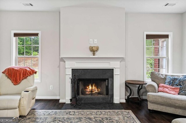 4960 Tadmore Ln, Lithonia, GA 30038 - sitting room featuring wood finished floors, a high end fireplace, and baseboards