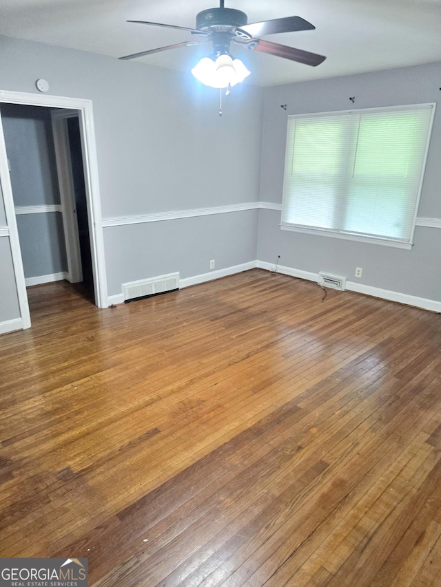 142 Wilshire Rd NE, Rome, GA 30161 - empty room featuring a ceiling fan, hardwood / wood-style floors, and baseboards