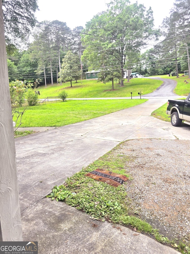 142 Wilshire Rd NE, Rome, GA 30161 - view of concrete driveway