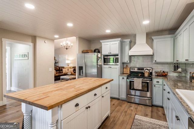 138 Mccombs Dr Unit 7, Blairsville, GA 30512 - kitchen featuring custom range hood, stainless steel appliances, wood counters, recessed lighting, and wood ceiling