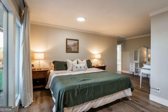 138 Mccombs Dr Unit 7, Blairsville, GA 30512 - bedroom featuring wood finished floors, baseboards, crown molding, and multiple windows