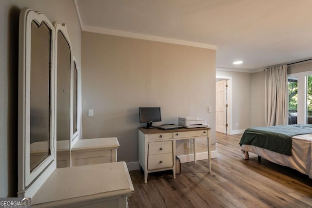 138 Mccombs Dr Unit 7, Blairsville, GA 30512 - bedroom with crown molding, wood finished floors, baseboards, recessed lighting, and an office area