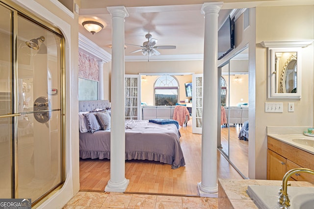 626 Palisade Dr, Ellijay, GA 30540 - bedroom featuring decorative columns, crown molding, and light wood-type flooring