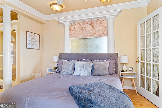 626 Palisade Dr, Ellijay, GA 30540 - bedroom with ornate columns, ornamental molding, and wood finished floors