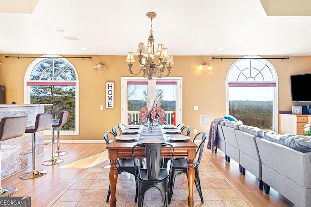 626 Palisade Dr, Ellijay, GA 30540 - dining area featuring a chandelier, recessed lighting, and light wood-type flooring