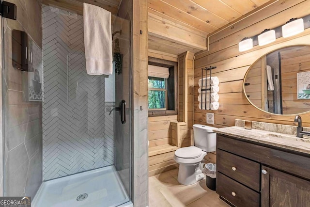full bathroom featuring toilet, a shower stall, vanity, wood walls, and wood ceiling