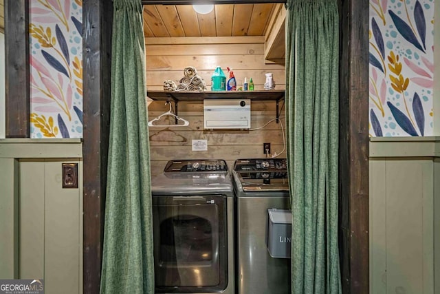 laundry area with separate washer and dryer and wooden ceiling