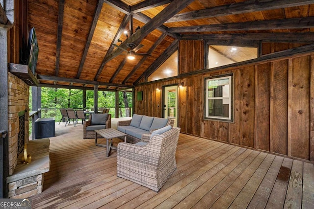 wooden deck with outdoor lounge area
