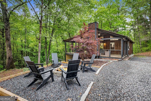 view of patio / terrace with an outdoor fire pit