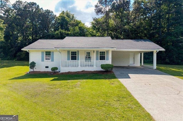 ranch-style home with a porch, driveway, a front lawn, and a carport