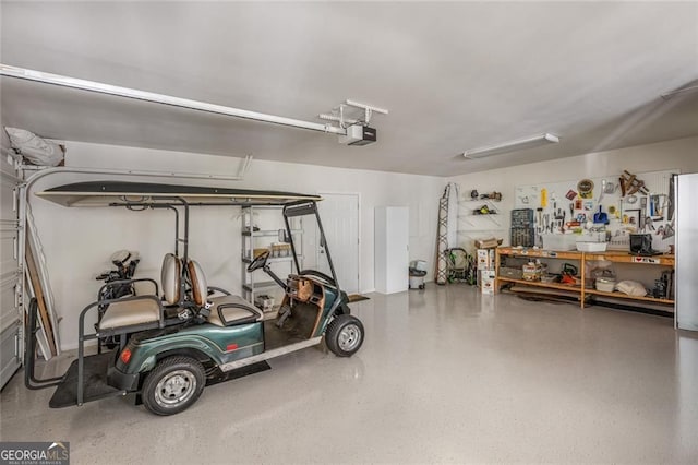 garage featuring a garage door opener