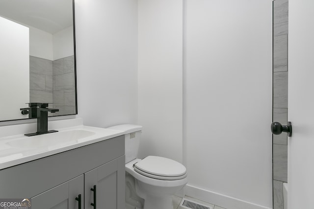 3215 Pennignton Cir, Atlanta, GA 30354 - bathroom with vanity, toilet, and a shower