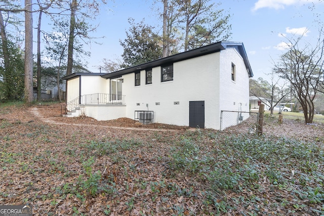 3215 Pennignton Cir, Atlanta, GA 30354 - rear view of property featuring central air condition unit