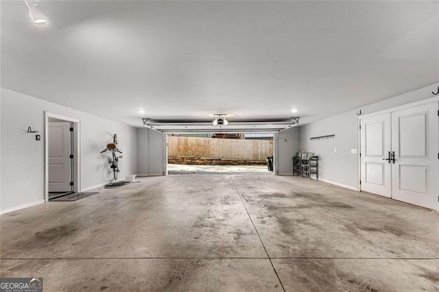 garage with baseboards
