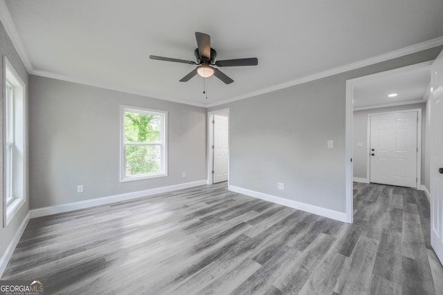 11 Cloverhurst Dr, Toccoa, GA 30577 - empty room with baseboards, ceiling fan, wood finished floors, and crown molding