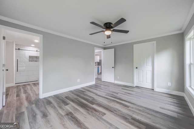 11 Cloverhurst Dr, Toccoa, GA 30577 - unfurnished bedroom with crown molding, wood finished floors, baseboards, ensuite bathroom, and a ceiling fan