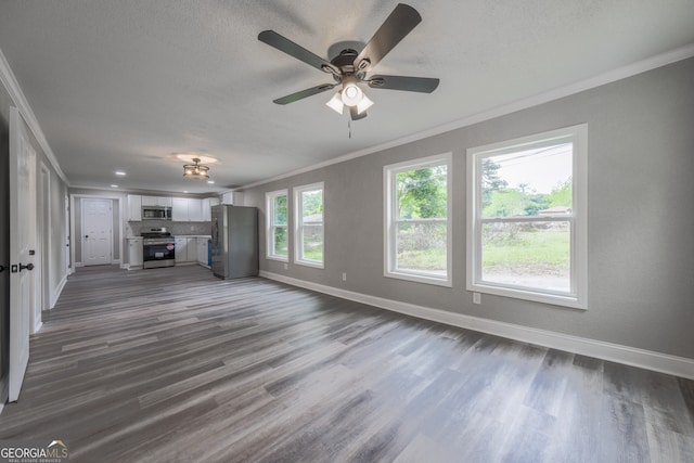 11 Cloverhurst Dr, Toccoa, GA 30577 - unfurnished living room with crown molding, baseboards, dark wood-type flooring, a ceiling fan, and a textured ceiling