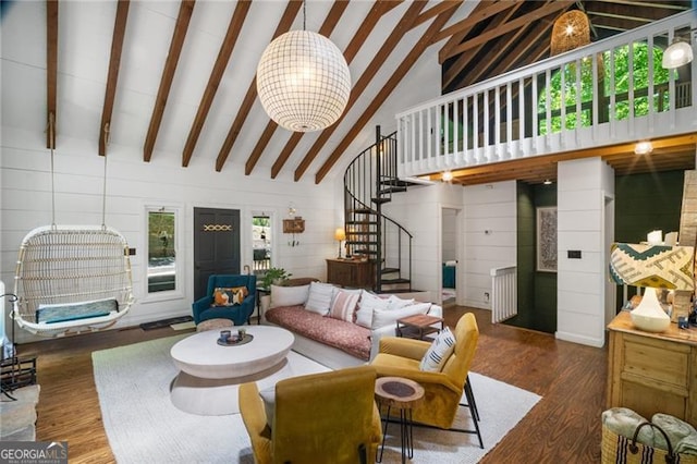 living room with wood finished floors, stairs, beam ceiling, high vaulted ceiling, and a chandelier