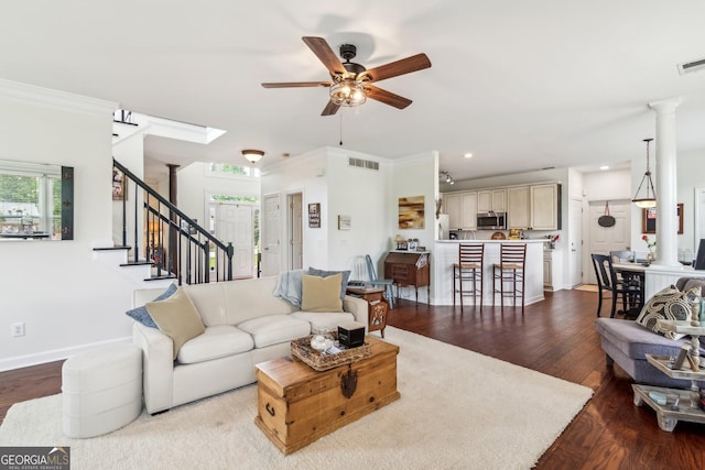 840 Yosemite Dr, Suwanee, GA 30024 - living area featuring a ceiling fan, wood finished floors, stairway, ornamental molding, and baseboards