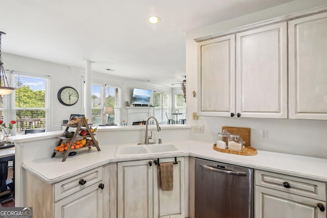 840 Yosemite Dr, Suwanee, GA 30024 - kitchen featuring stainless steel dishwasher, a sink, light countertops, a peninsula, and recessed lighting