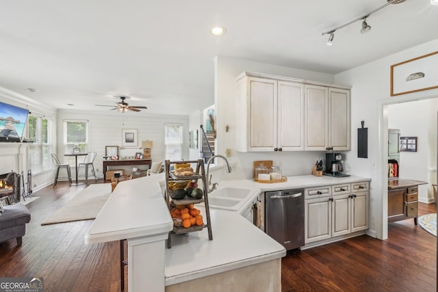 840 Yosemite Dr, Suwanee, GA 30024 - kitchen featuring stainless steel dishwasher, a ceiling fan, a peninsula, dark wood finished floors, and light countertops