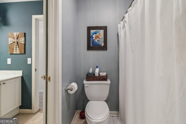 840 Yosemite Dr, Suwanee, GA 30024 - full bathroom featuring baseboards, vanity, and toilet