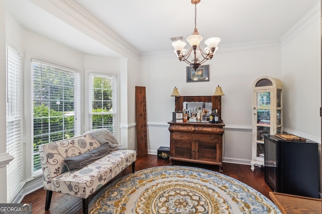840 Yosemite Dr, Suwanee, GA 30024 - living area with a chandelier, ornamental molding, wood finished floors, and baseboards