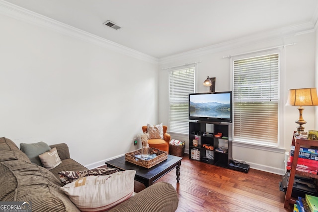 840 Yosemite Dr, Suwanee, GA 30024 - living area with crown molding, wood finished floors, and baseboards