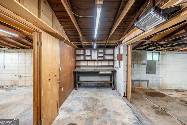 below grade area with concrete block wall