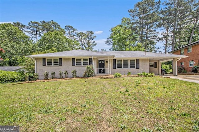 3436 Dodson, Atlanta, GA 30344 - ranch-style home featuring driveway, a front yard, a carport, and brick siding