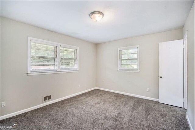 3436 Dodson, Atlanta, GA 30344 - spare room featuring carpet flooring and baseboards