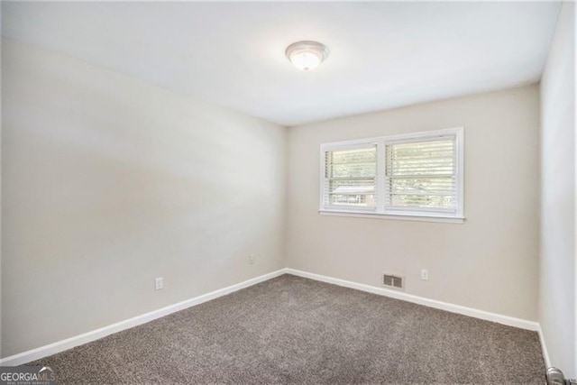 3436 Dodson, Atlanta, GA 30344 - spare room featuring carpet and baseboards