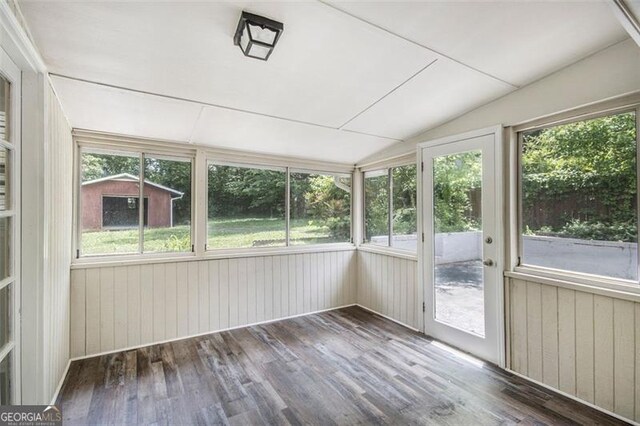 3436 Dodson, Atlanta, GA 30344 - unfurnished sunroom with vaulted ceiling and wood finished floors