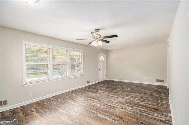 3436 Dodson, Atlanta, GA 30344 - unfurnished room with ceiling fan, wood finished floors, and baseboards