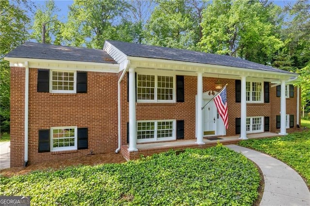 view of front of property with brick siding