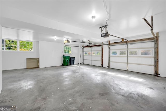 garage featuring a garage door opener