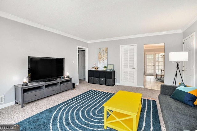 living area with crown molding, carpet floors, and baseboards