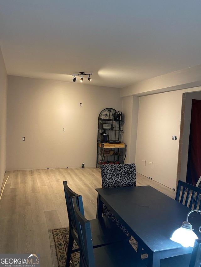 dining room with wood finished floors