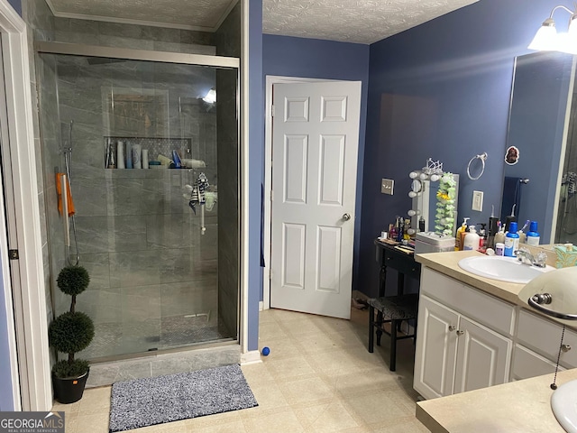 565 Miles Ct, Locust Grove, GA 30248 - bathroom with vanity, a stall shower, a textured ceiling, and tile patterned floors