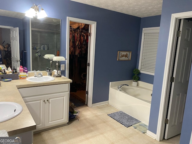 565 Miles Ct, Locust Grove, GA 30248 - full bath with double vanity, a bath, a shower stall, a walk in closet, and tile patterned floors