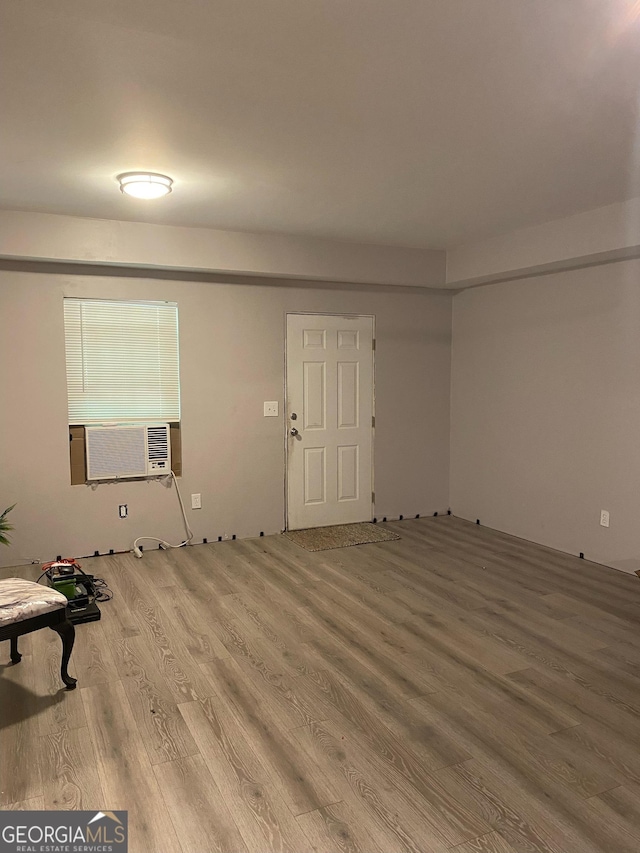 565 Miles Ct, Locust Grove, GA 30248 - entryway with light wood-style flooring and cooling unit