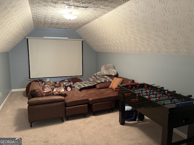 565 Miles Ct, Locust Grove, GA 30248 - carpeted home theater room with vaulted ceiling and baseboards
