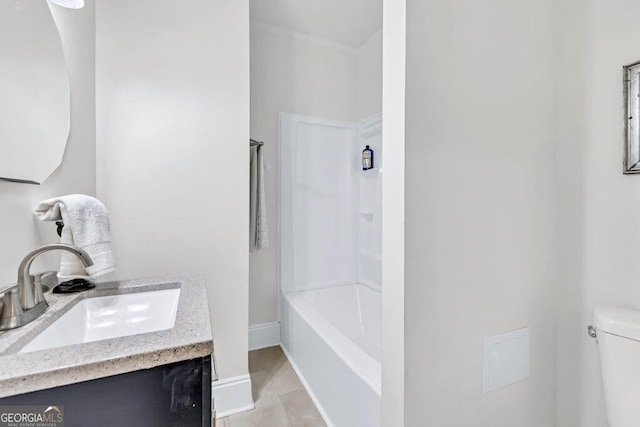 11 Poplar St, Porterdale, GA 30014 - bathroom featuring toilet, tile patterned floors, and vanity
