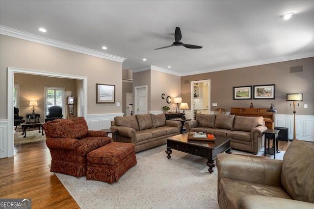 1681 Wild Azalea Ln, Athens, GA 30606 - living room featuring a ceiling fan, crown molding, recessed lighting, a decorative wall, and wainscoting